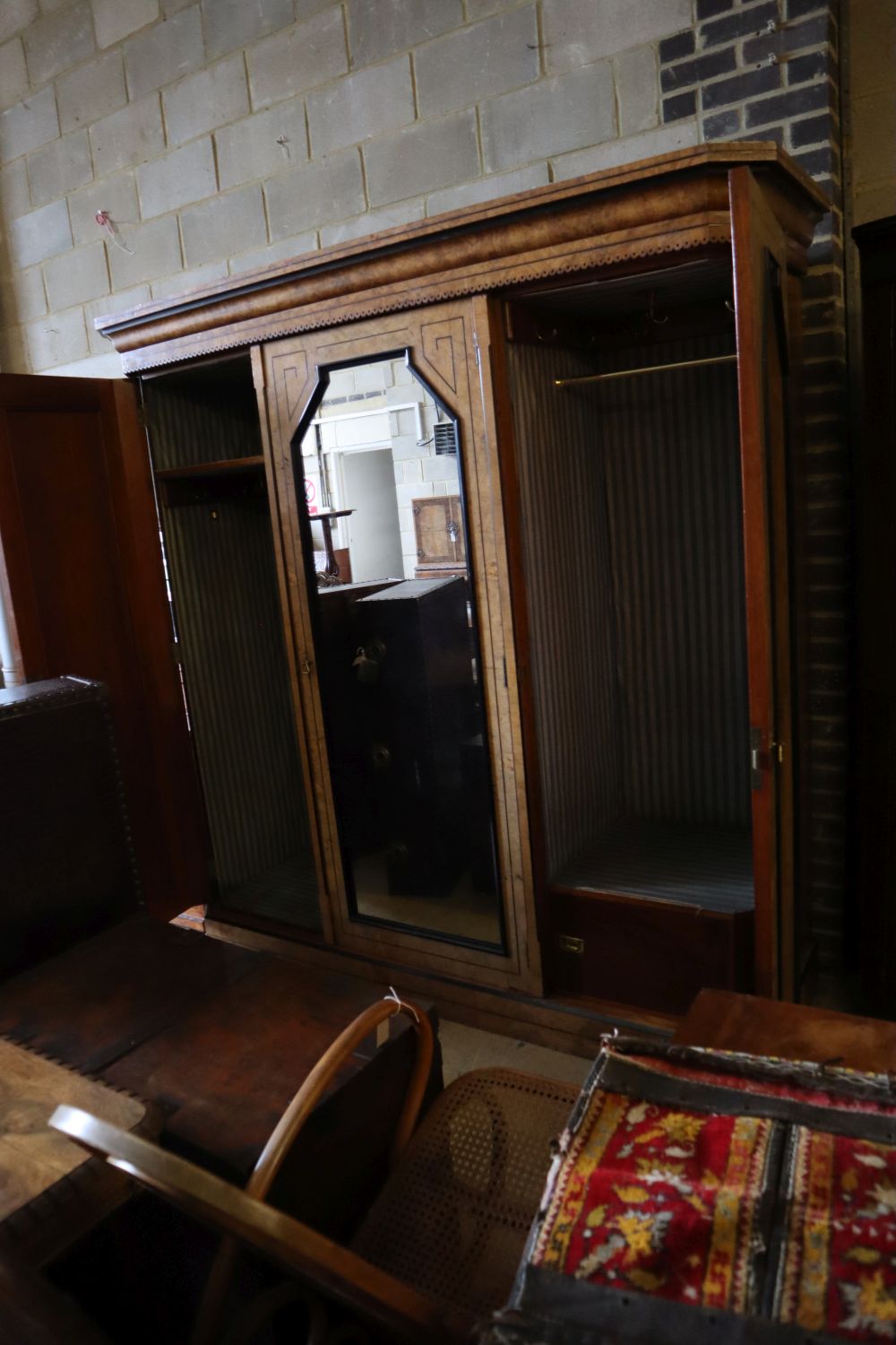 A late Victorian inlaid burr oak triple wardrobe, width 220cm depth 68cm height 221cm